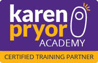 Logo of Karen Pryor Academy with the text "karen pryor ACADEMY" and "CERTIFIED TRAINING PARTNER" on a yellow background, ideal for aspiring dog walkers.